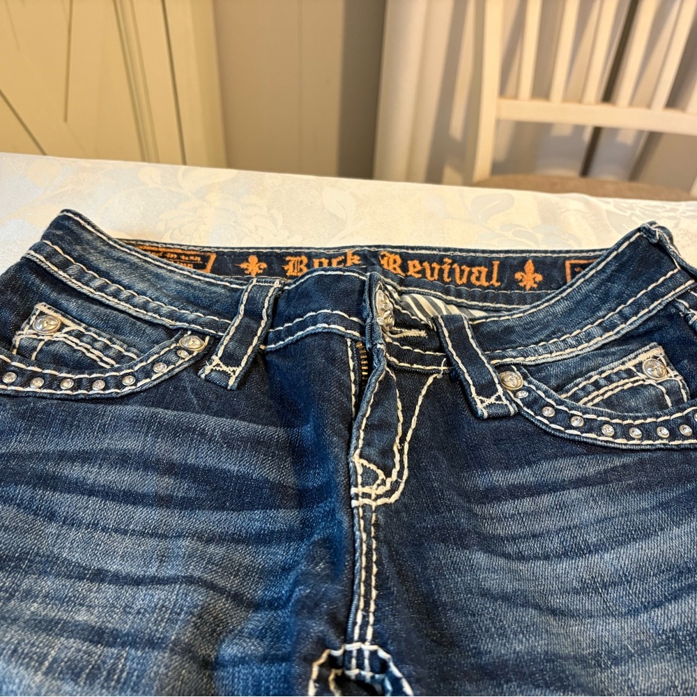 Rock Revival Elaina ..Dark Blue, 25 w 31.5 L  stressed jeans like new low rise